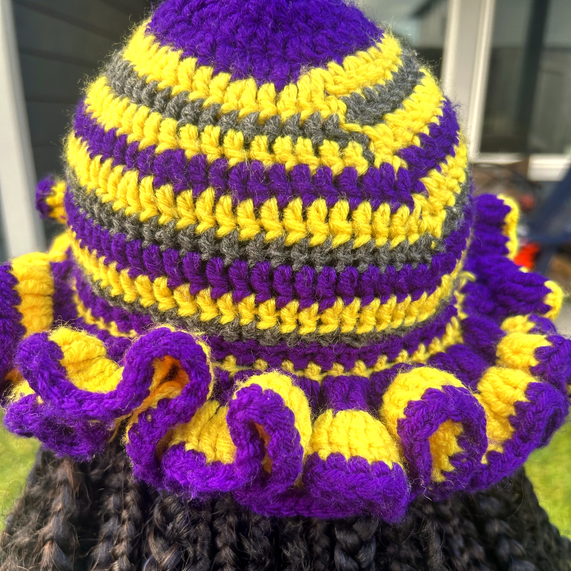Handmade Jamaican purple gold and charcoal crochet hat with layered ruffle brim