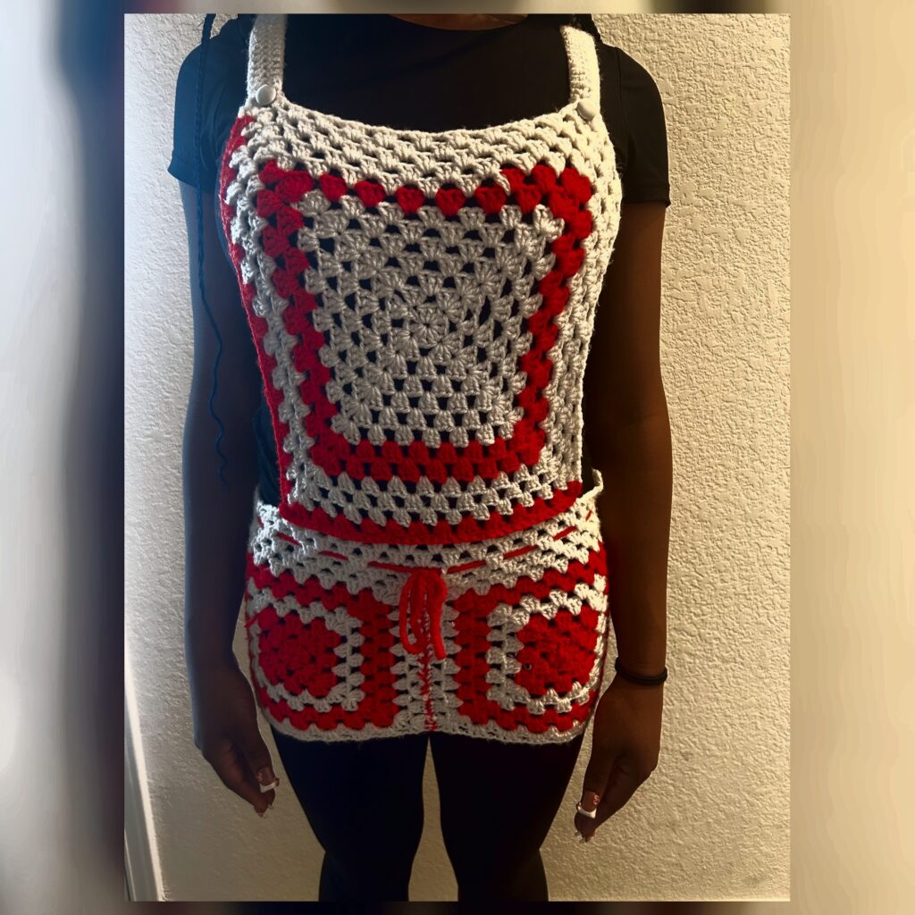 Handmade Jamaican red and cream granny-square crochet skirt romper front view with drawstring waist