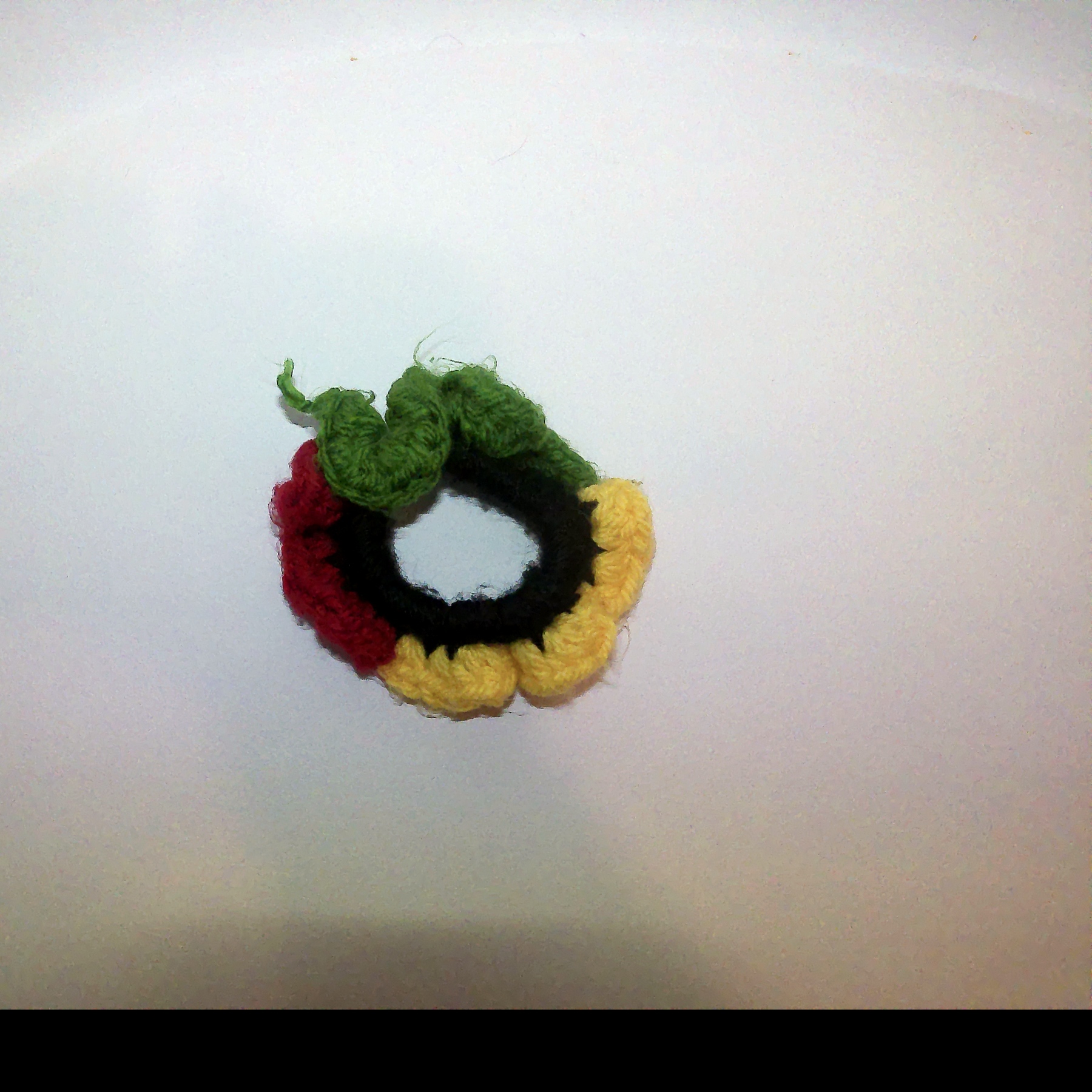 Handmade Jamaican red, gold, green and black colorblock crochet scrunchie